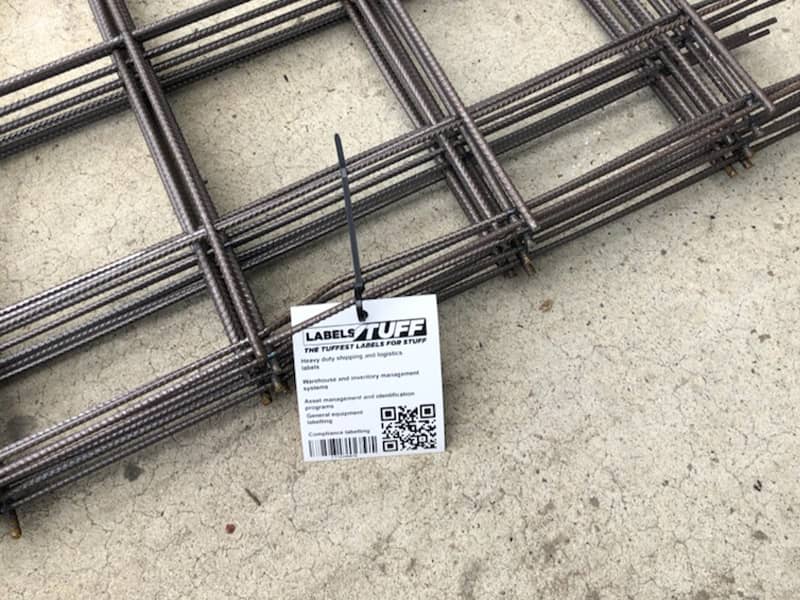 Warehouse and Shipping Label on Concrete Wire