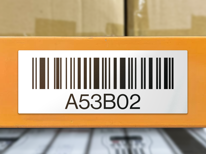 Reflective Barcode Label on orange shelving