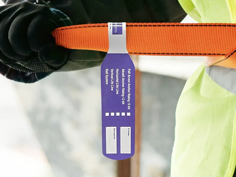 purple harness inspection tag fall safety